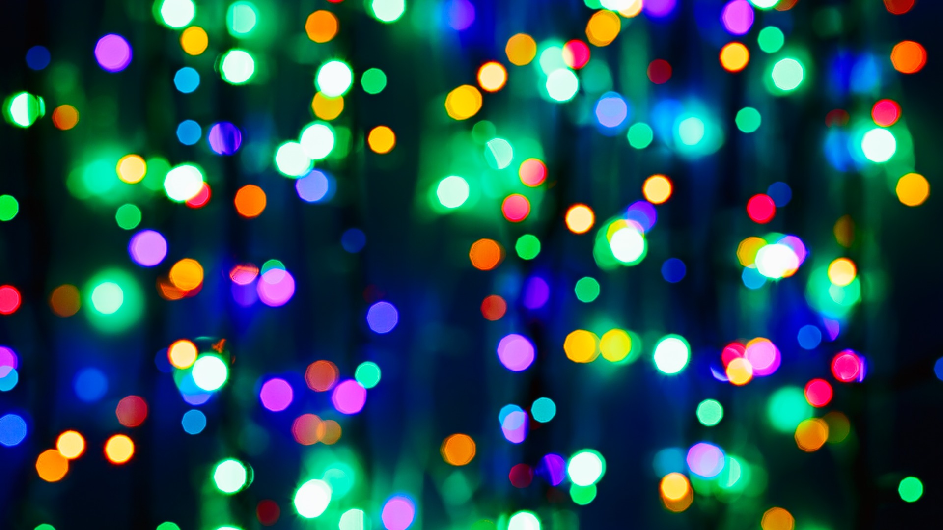 LED holiday light strings blurred in Rowlett, TX.