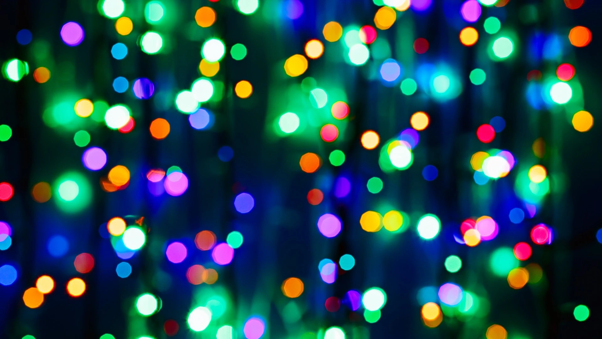 LED holiday light strings blurred in Rowlett, TX.