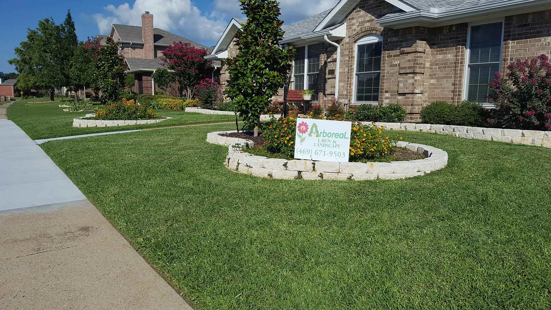 Signage from Arboreal place in a landscape bed in Rockwall, TX.