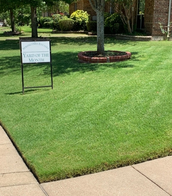 Yard of the month signage placed in a client's yard in Rockwall, TX.
